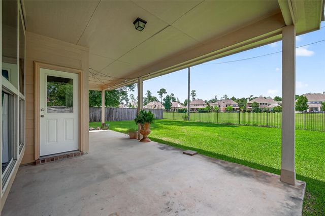 83 W Wading Pond Circle, The Woodlands, TX 77375