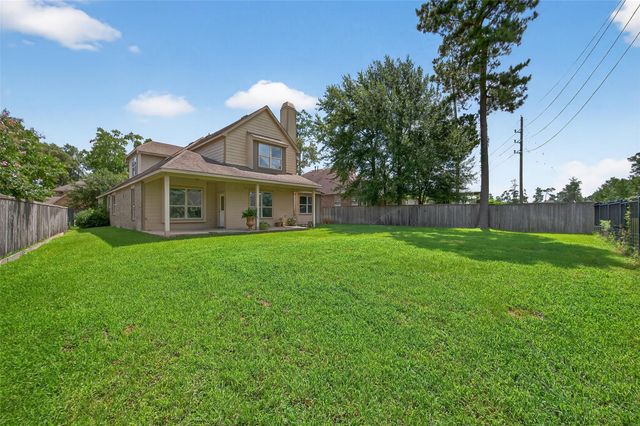 83 W Wading Pond Circle, The Woodlands, TX 77375