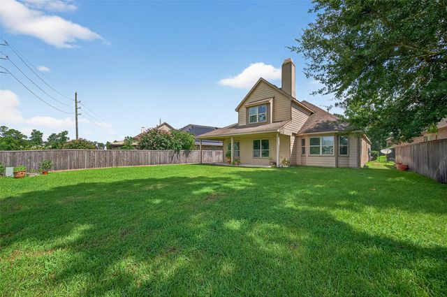 83 W Wading Pond Circle, The Woodlands, TX 77375