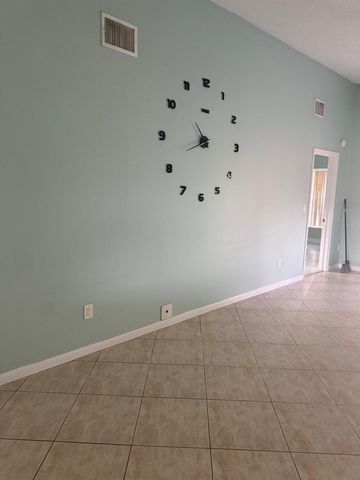 1463 Summit Run Circle, West Palm Beach, FL 33415