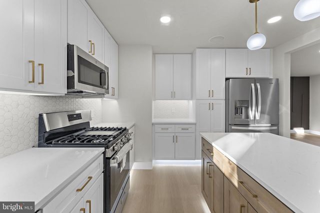 9603 WOODLAND AVE, Lanham, MD 20706