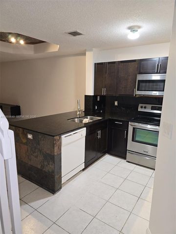 14272 SW 121st Place 9, Miami, FL 33186