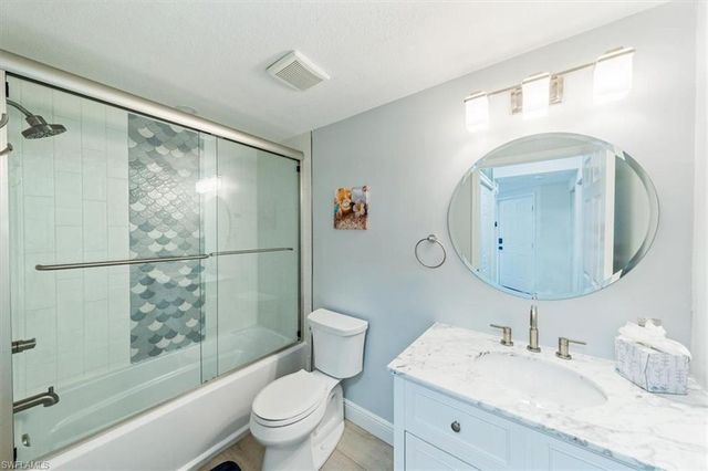 6914 Satinleaf RD N 103, Naples, FL 34109