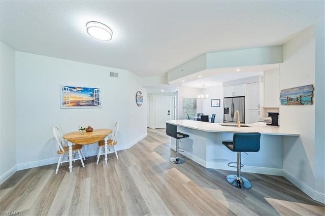 6914 Satinleaf RD N 103, Naples, FL 34109