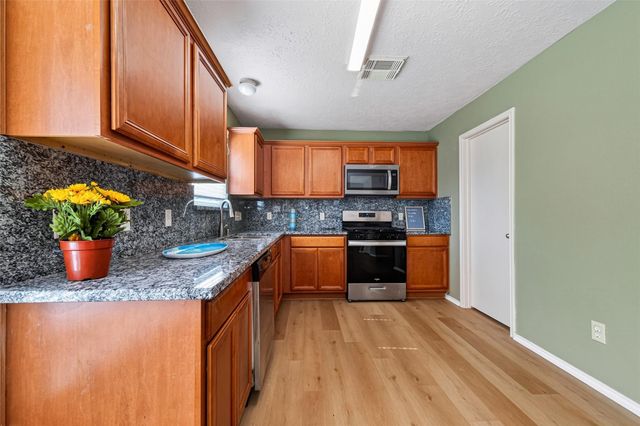 11030 Knobbley Oak Ct, Cypress, TX 77065