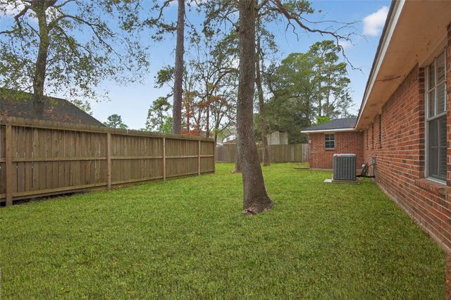 601 Chateau Woods Parkway Drive, Conroe, TX 77385