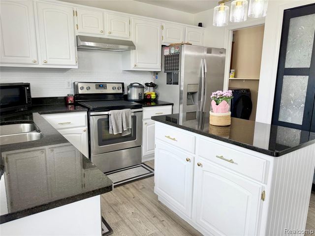 55856 Serene Drive, Macomb, MI 48042
