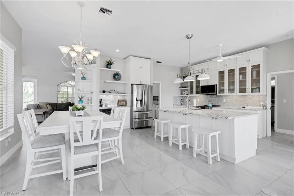 Image 10 of property listing at 5221 SW 9th PL, Cape Coral, FL 33914