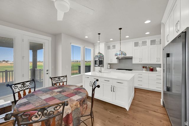 2431 N HOODED CRANE CIR, Clinton, UT 84015