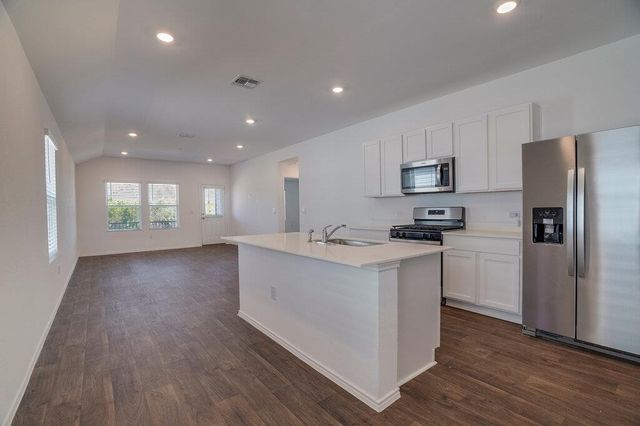 12317 Silversmith LN, Mustang Ridge, TX 78610