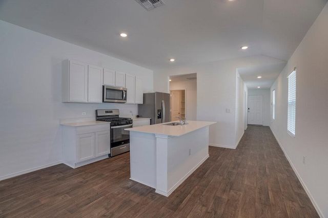 12317 Silversmith LN, Mustang Ridge, TX 78610