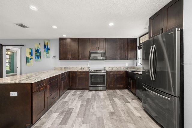 10702 WILLIAM TELL DRIVE, Orlando, FL 32821