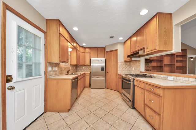 12122 Dorrance Lane, Meadows Place, TX 77477