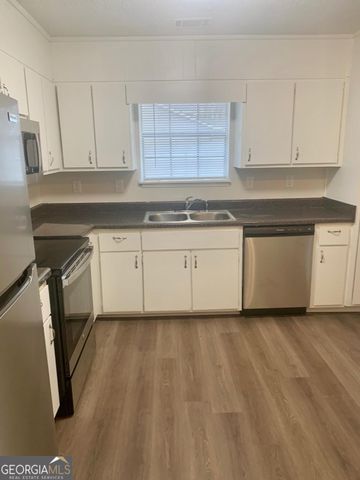 5663 Saint Thomas Drive, Lithonia, GA 30058