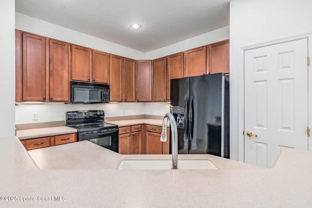 208 Tin Roof Avenue, Cape Canaveral, FL 32920