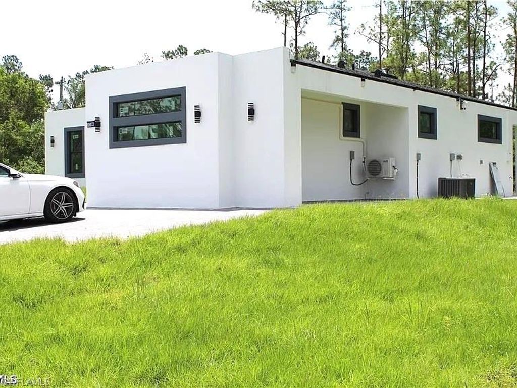 3306 E 2ND ST, LEHIGH ACRES, FL 33936 — photo 3