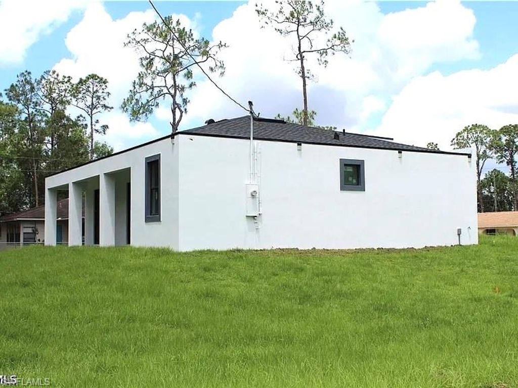 3306 E 2ND ST, LEHIGH ACRES, FL 33936 — photo 4