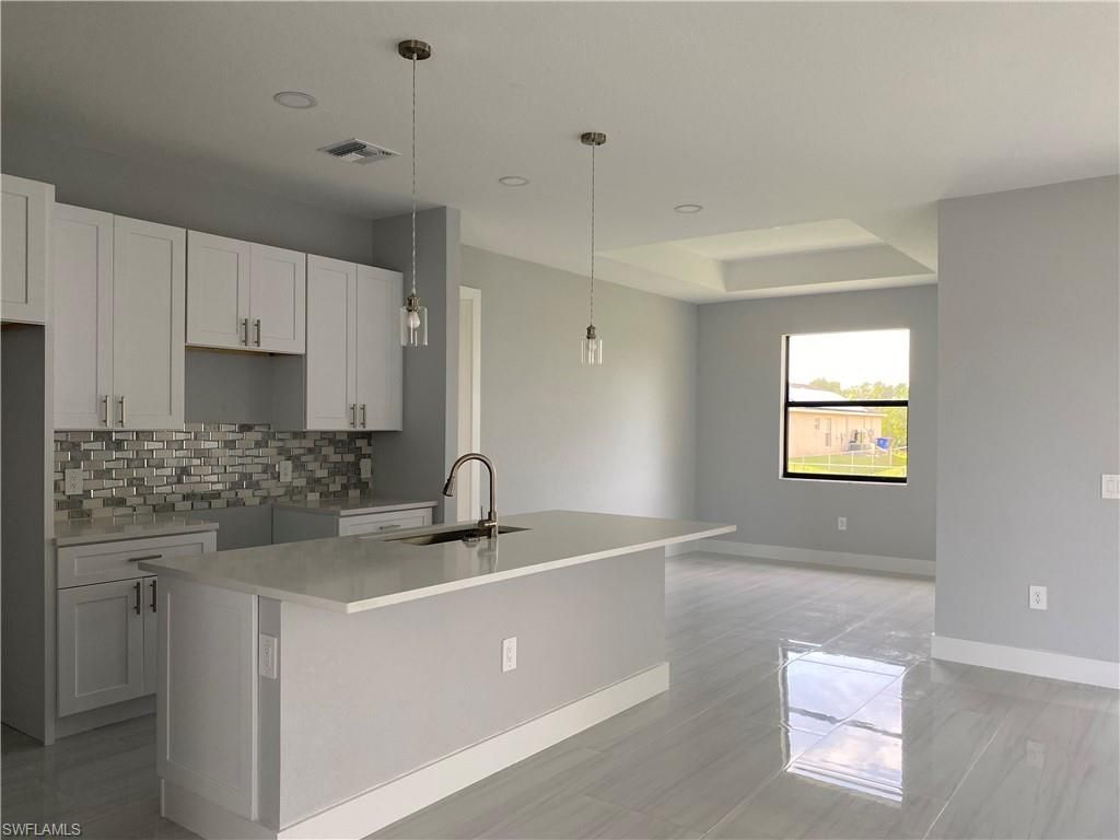 3303 16th ST SW, LEHIGH ACRES, FL 33976 — exterior