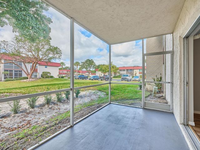 12021 W Greenway Drive 105, Royal Palm Beach, FL 33411
