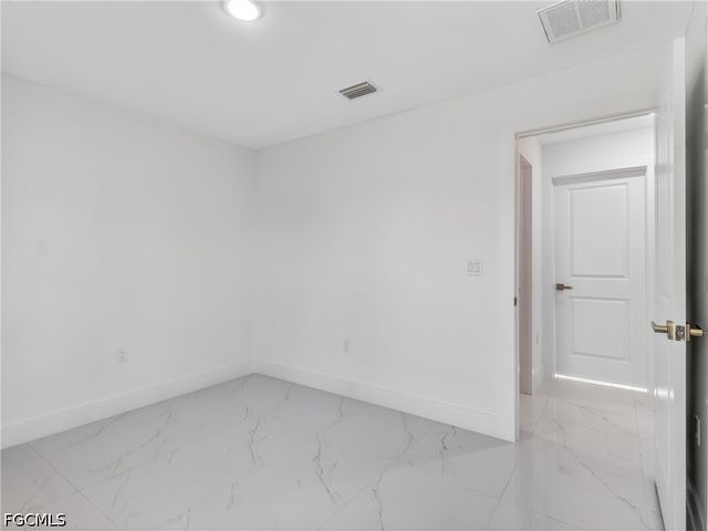 814 Milano AVE S, Lehigh Acres, FL 33974