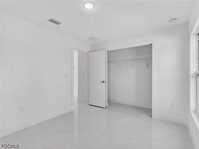 814 Milano AVE S, Lehigh Acres, FL 33974