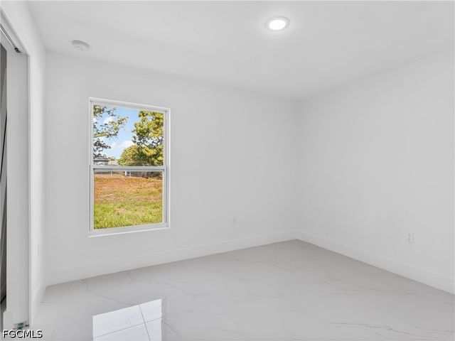 814 Milano AVE S, Lehigh Acres, FL 33974