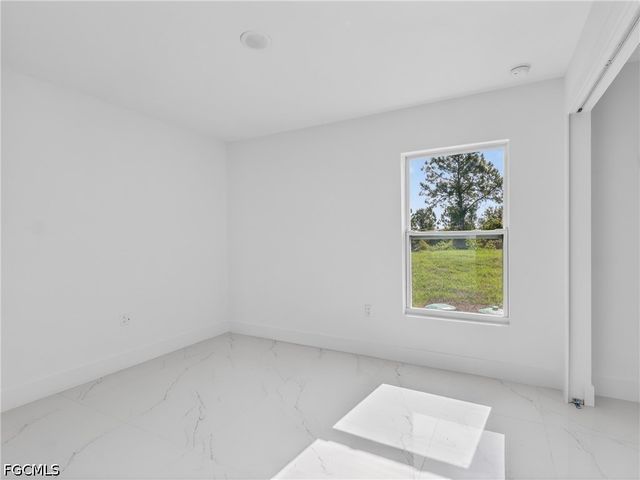 814 Milano AVE S, Lehigh Acres, FL 33974