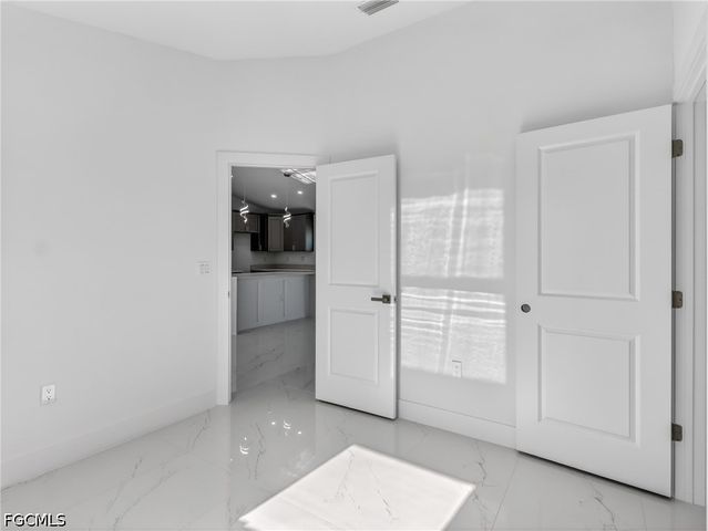 814 Milano AVE S, Lehigh Acres, FL 33974