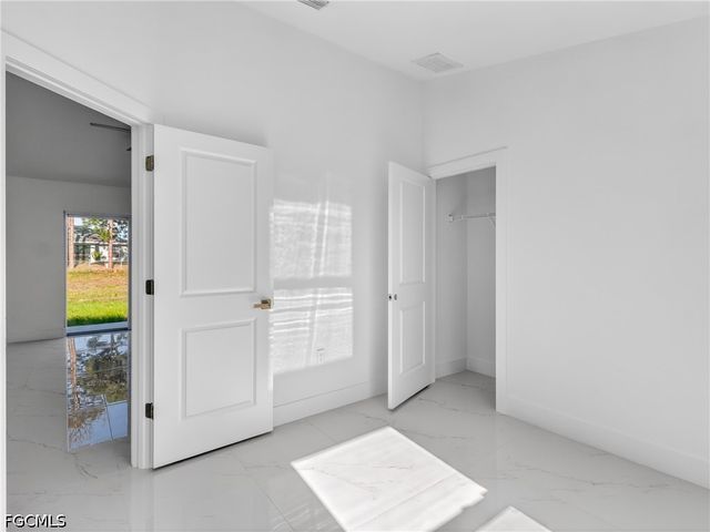 814 Milano AVE S, Lehigh Acres, FL 33974