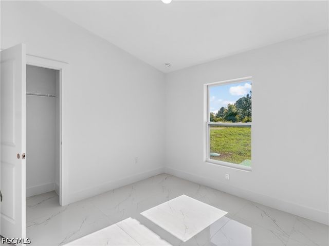 814 Milano AVE S, Lehigh Acres, FL 33974