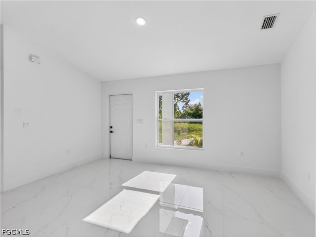 814 Milano AVE S, Lehigh Acres, FL 33974