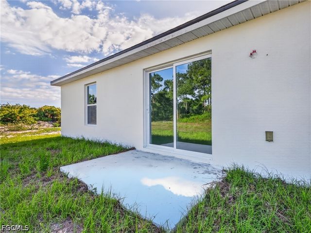 814 Milano AVE S, Lehigh Acres, FL 33974