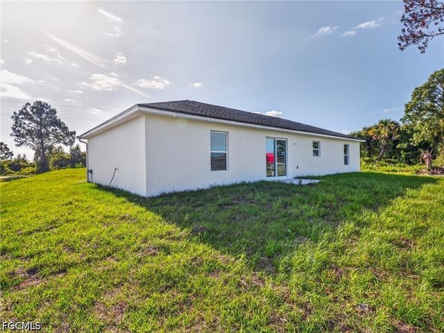 814 Milano AVE S, Lehigh Acres, FL 33974