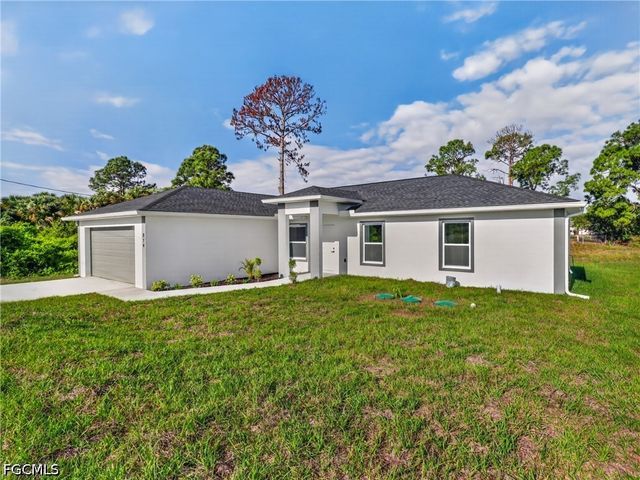814 Milano AVE S, Lehigh Acres, FL 33974