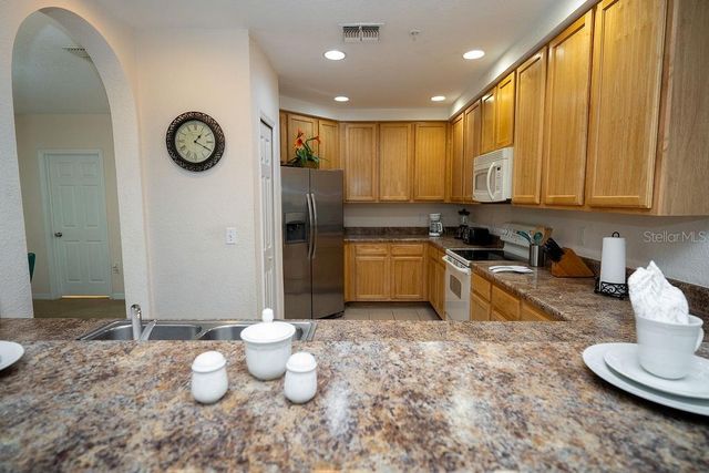 3050 PIRATES RETREAT COURT 208, Kissimmee, FL 34747