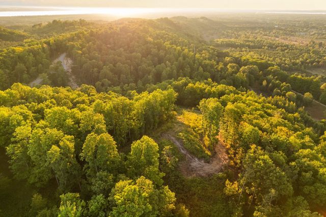 H Retreats Way, Rapid City, MI 49676