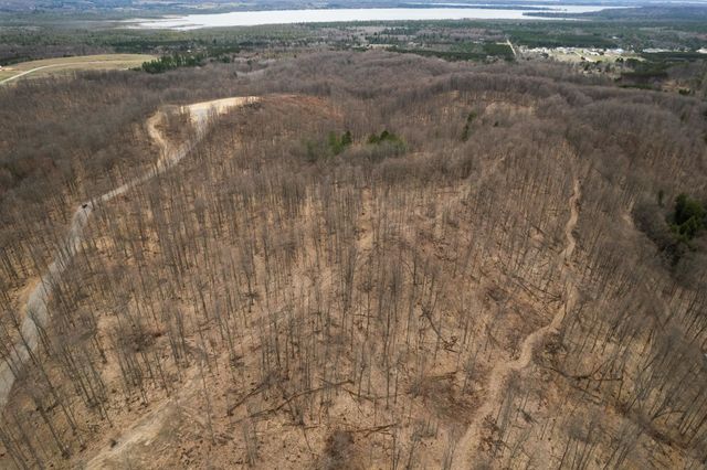 H Retreats Way, Rapid City, MI 49676