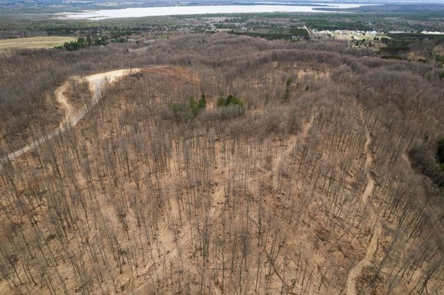 H Retreats Way, Rapid City, MI 49676