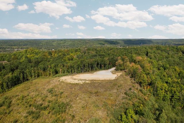 H Retreats Way, Rapid City, MI 49676