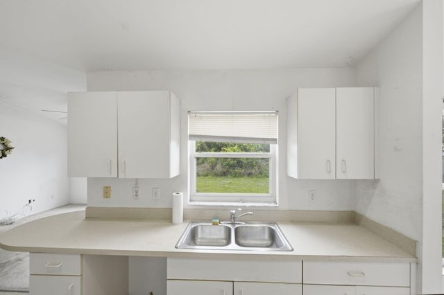 1566 SE Sutton Street, Port St. Lucie, Port St Lucie, FL 34983