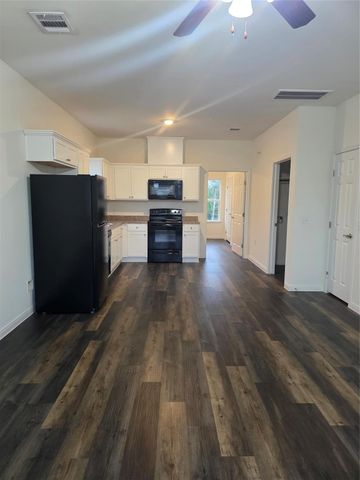 6311 White Oak Drive, Hitchcock, TX 77563