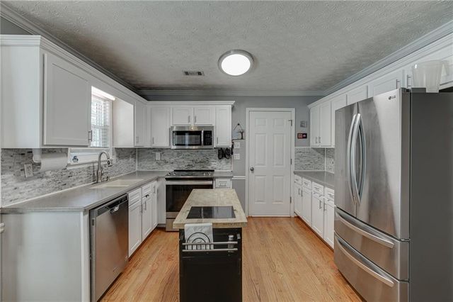 3220 Plantation Run Drive, Loganville, GA 30052
