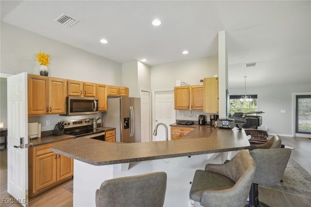 940 Belmont ST E, Lehigh Acres, FL 33974
