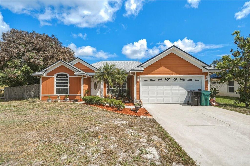 437 SW Kaabe Avenue, Port St. Lucie, FL 34953
