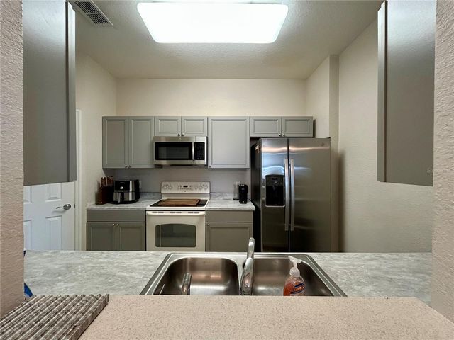 6466 CAVA ALTA DRIVE 404, Orlando, FL 32835