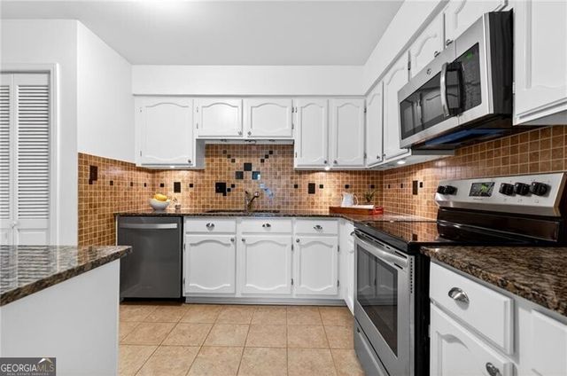 4590 VILLAGE OAKS Circle, Dunwoody, GA 30338