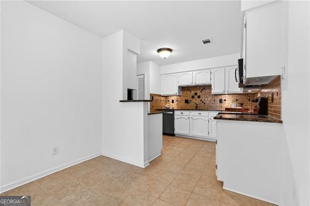 4590 VILLAGE OAKS Circle, Dunwoody, GA 30338