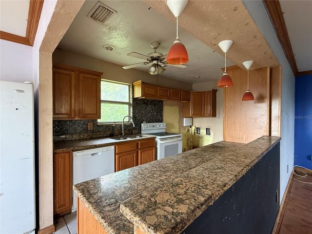2027 MIDNIGHT STREET, Port Charlotte, FL 33948