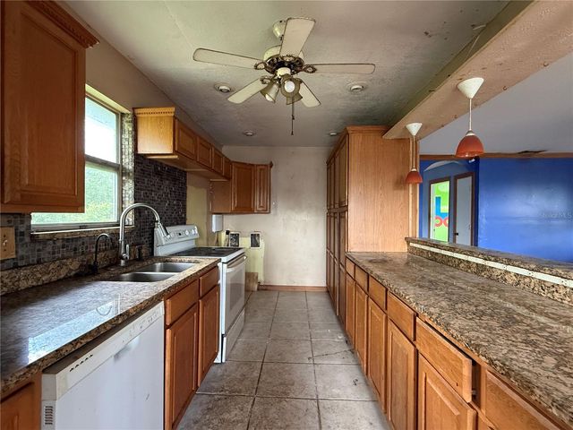 2027 MIDNIGHT STREET, Port Charlotte, FL 33948