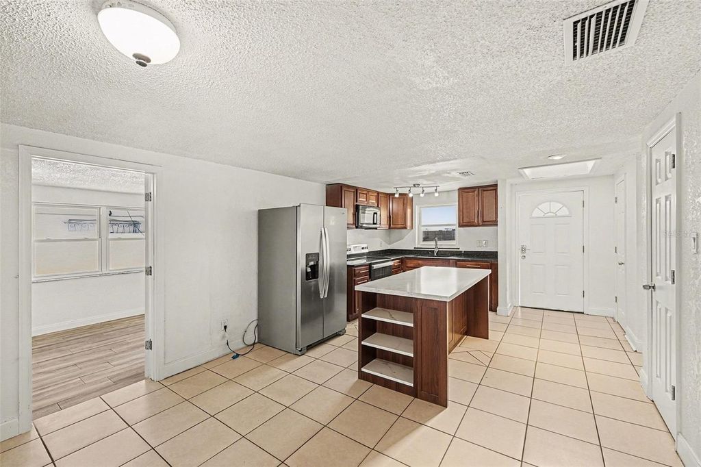 Image 3 of property listing at 9031 TREE VALLEY CIRCLE, Tampa, FL 33615